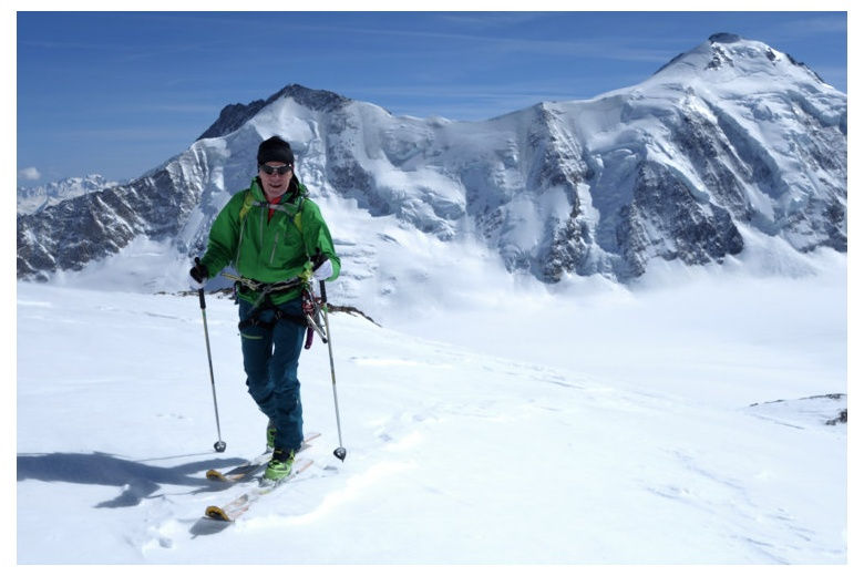 tour skier progressing along the oberland glacier