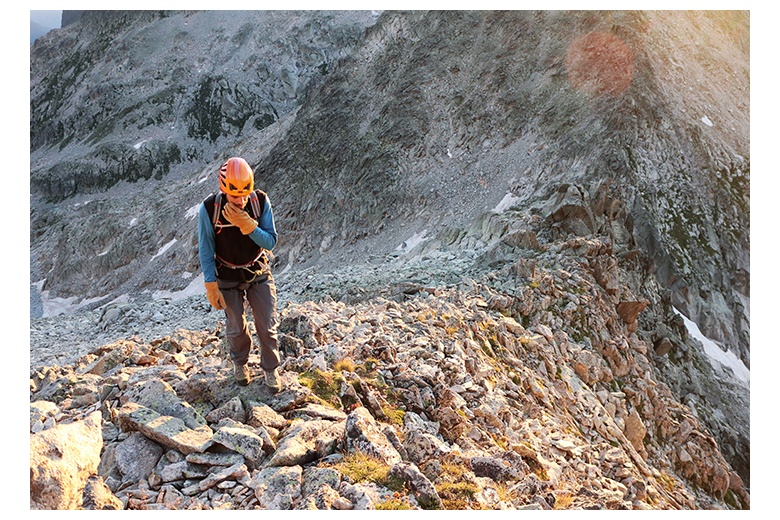 mountain climber at the beginning of the route to the aneto's summit via the salenques-tempestades ridge
