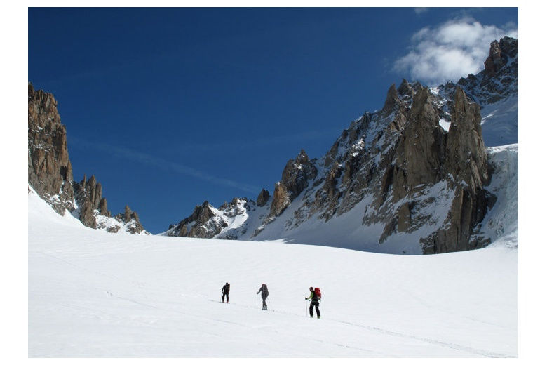 group climbing towards the Chardonnet pass between the chardonnet spire and argentiere