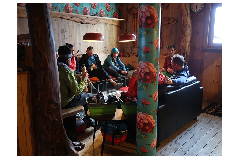 group of people recovering and resting at ventosa i calvell hut